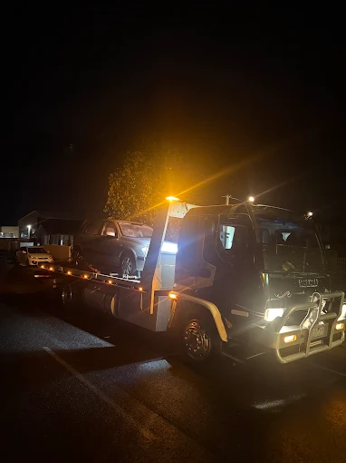 Seaco Towing tow truck working a night recovery in Geelong