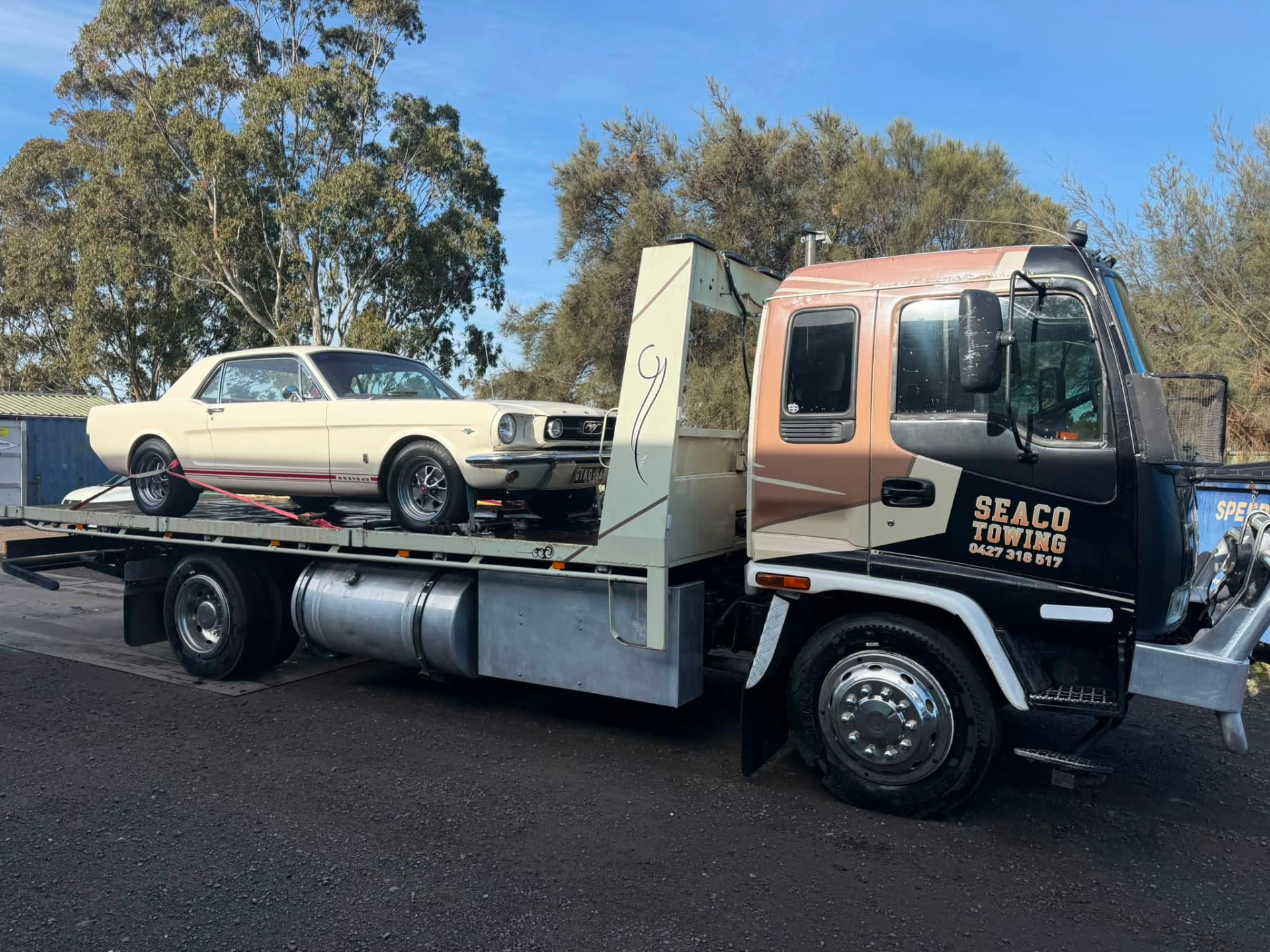 Classic Ford Mustang loaded on the Seaco Towing tilt tray in Geelong